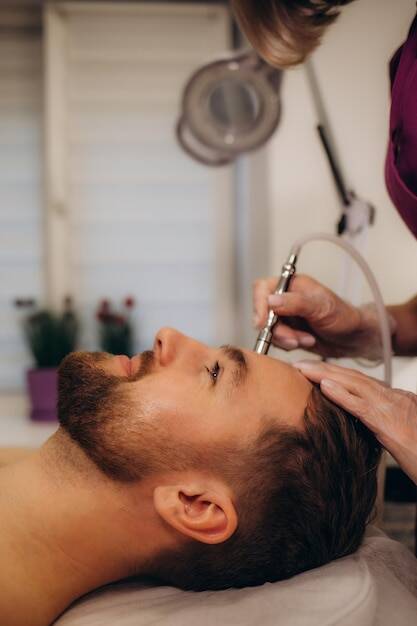 Pore cleansing facial on a male client